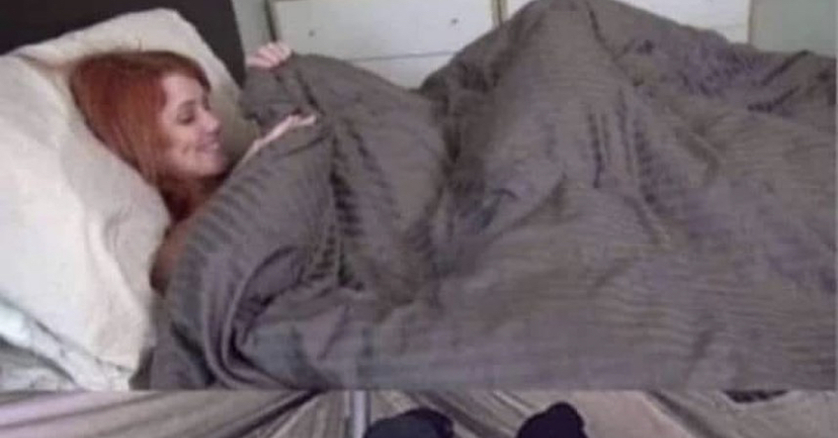 Moaning while masturbating under sheets photo