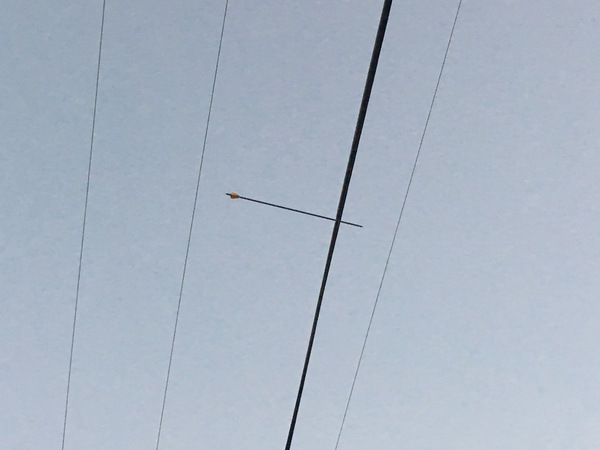 Someone managed to shoot an arrow into a power line - Photo, Arrow, 
