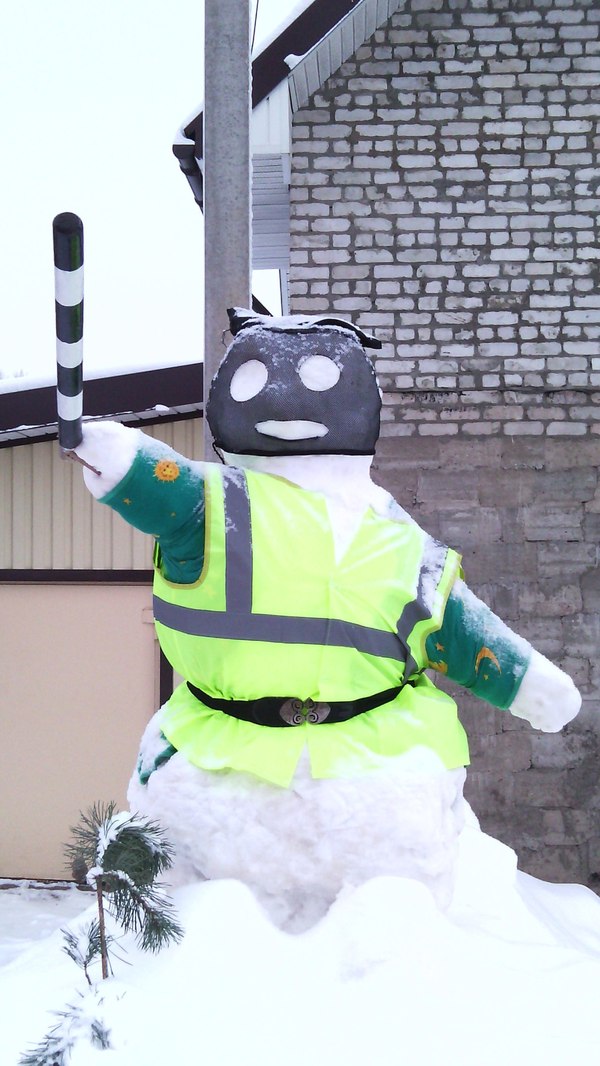 Here is such a creative snowman in our city by the road - snowman, Traffic cop, Winter, Creative