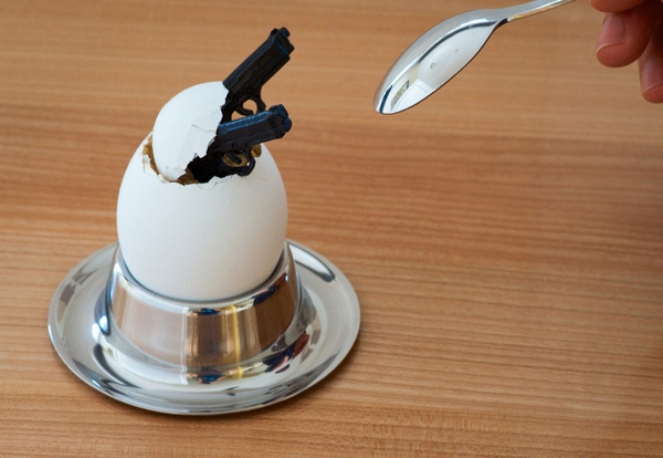 Now slowly lower the spoon and place it on the table. - Eggs, A spoon, Table