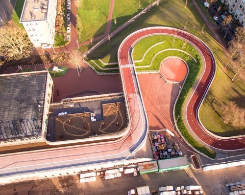 Bicycle bridge in Utrecht, passing through the roof of the building. - Architecture, A bike, Bridge, Holland, Netherlands (Holland)