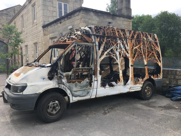 A symbol of the fact that nature always takes over. - Ford, Transit, Sculpture, Art object, Art, Tree, Auto