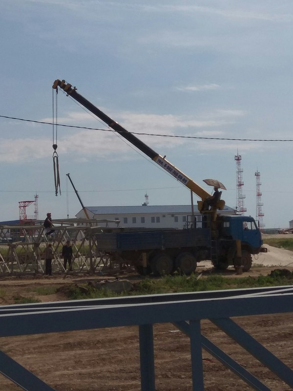 Under an umbrella. - My, Kamaz, Tap, Building