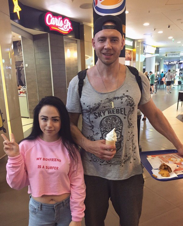 Self-criticism. The inscription on the jacket of the girl: My boyfriend is a surfer - Surfer, Board