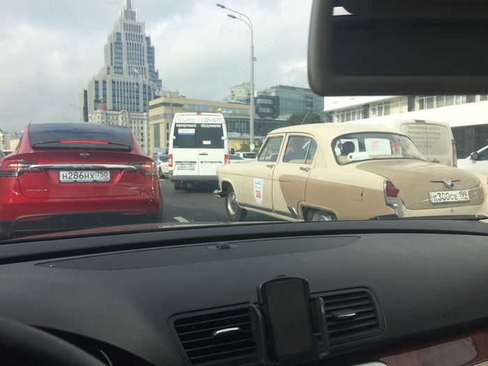 20th and 21st century in one photo - My, Auto, Moscow, Made in USSR, USA vs USSR, Tesla, Volga, Hello reading tags