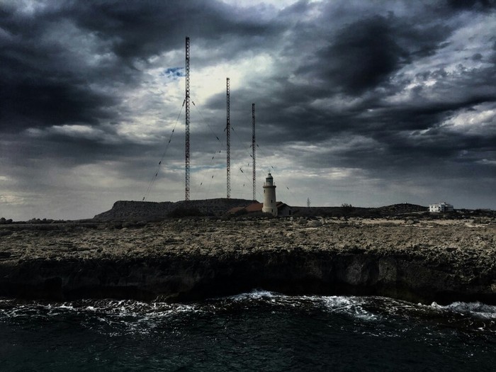 The lighthouse and antennas of the French radio station in Cyprus from the sea. - My, Cyprus, Lighthouse, Bad weather, Photo on sneaker
