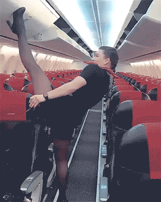 When you try to imitate an Asian who can do better - GIF, Girls, Airplane, Flexibility, Stretching, Stewardess
