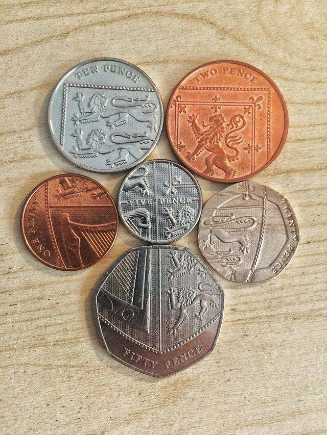 It turns out that if you collect all the British coins, you get a shield that represents the royal coat of arms. - Coin, Coat of arms, Money, Great Britain