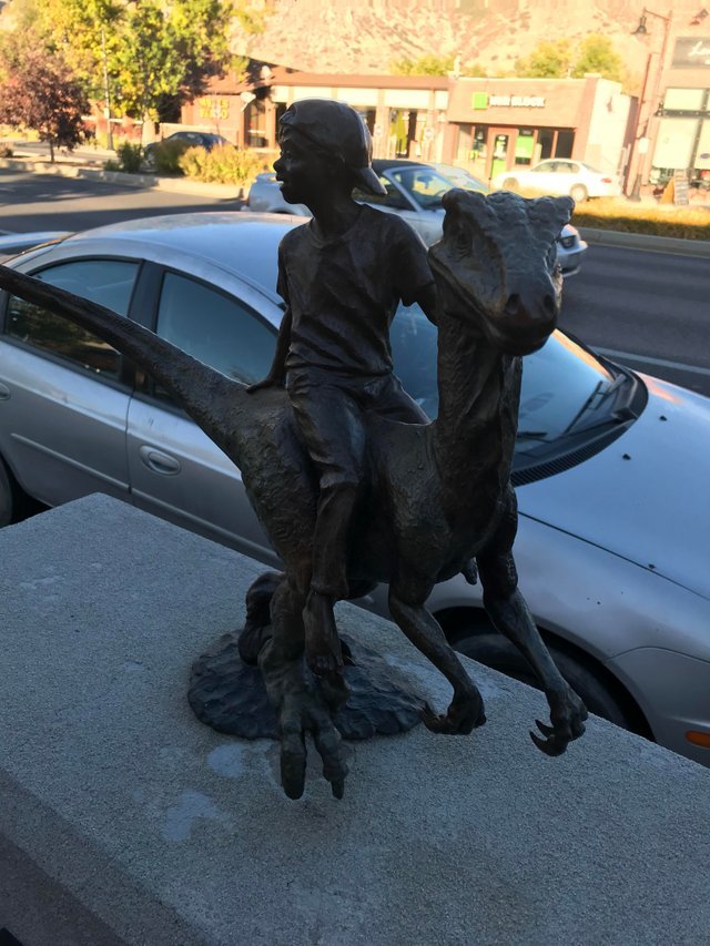 City sculpture - a boy on a velociraptor - Painting, Sculpture, Art, Dinosaurs, Installation