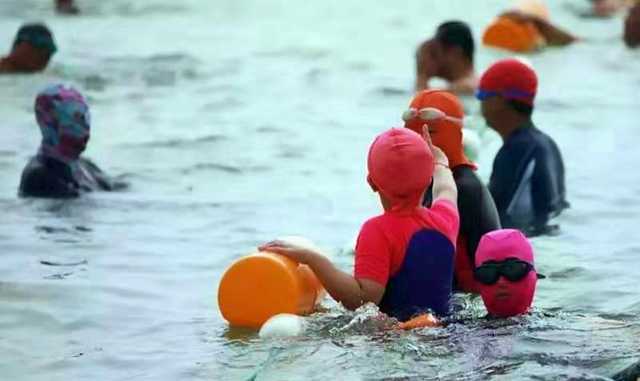 Facekini, increasingly gaining popularity on the beaches of China... . - China, Chinese, Swimsuit, Costume, Mask, Oddities, Interesting, , Longpost