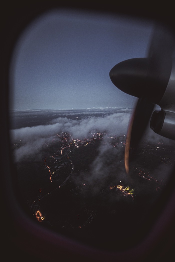Embers burning clouds - My, Airplane, Porthole, Flight, Night city, Helsinki, Travels, Finland, Sky