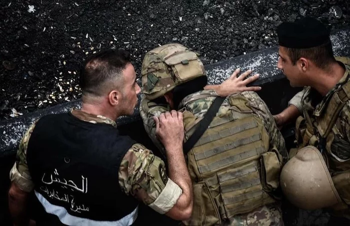 A Lebanese soldier cries after being ordered to attack peaceful protesters. - Person, Sadness, Humanity, Lebanon, Demonstration, Rally, Tears, The photo