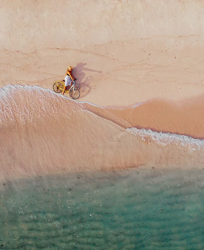 There are different ways to ride the waves - My, Wave, A bike, Drone, Ocean