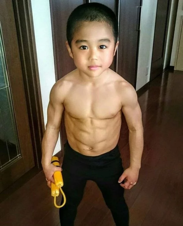 The boy prefers films with Bruce Lee instead of cartoons - Sport, Children, Nunchucks, Martial arts, Bruce Lee, Japan, Video