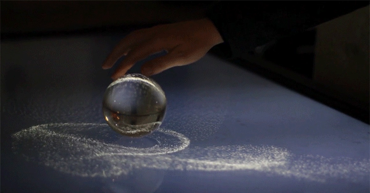 Kinetic sand - interactive glass sphere installation - Art, Installation, GIF