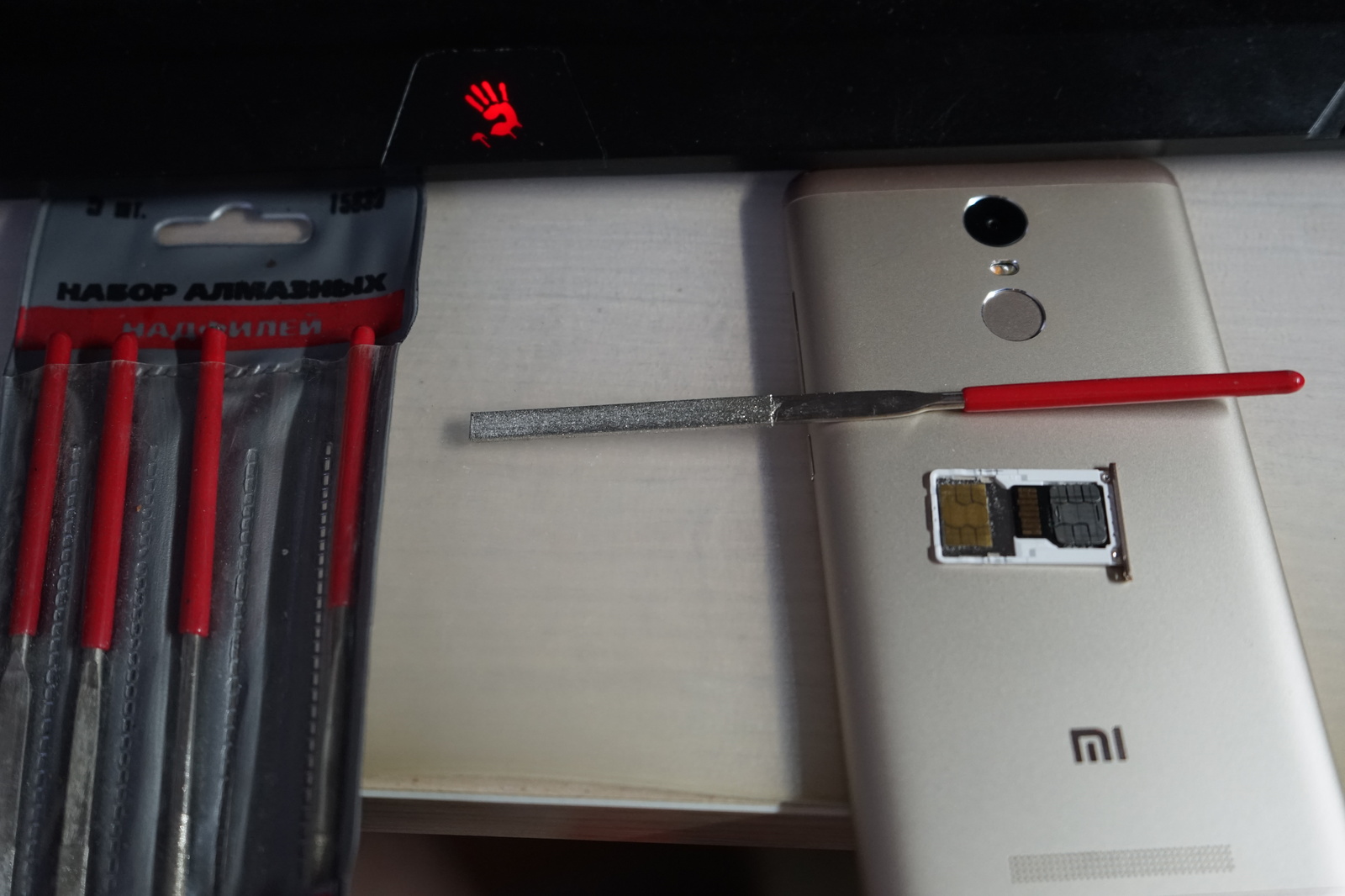 How to cram the non-pushable, or two SIM cards + a memory card in two slots. part 2 - My, My, SIM card, Rukozhop, Xiaomi redmi Note 3 PRO, Soldering iron, Pliers, Longpost