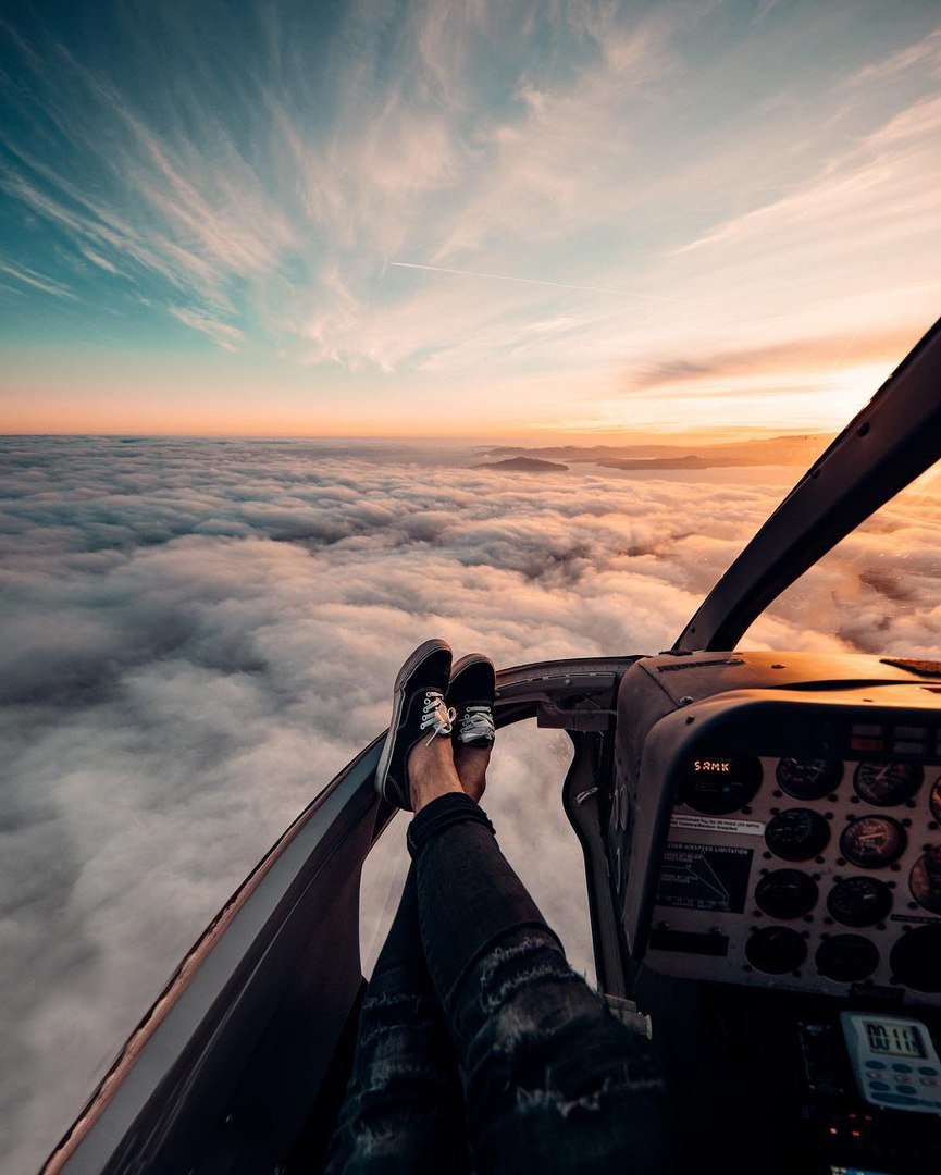 View from the cockpit of a helicopter. - Helicopter, Photo, Clouds, Height