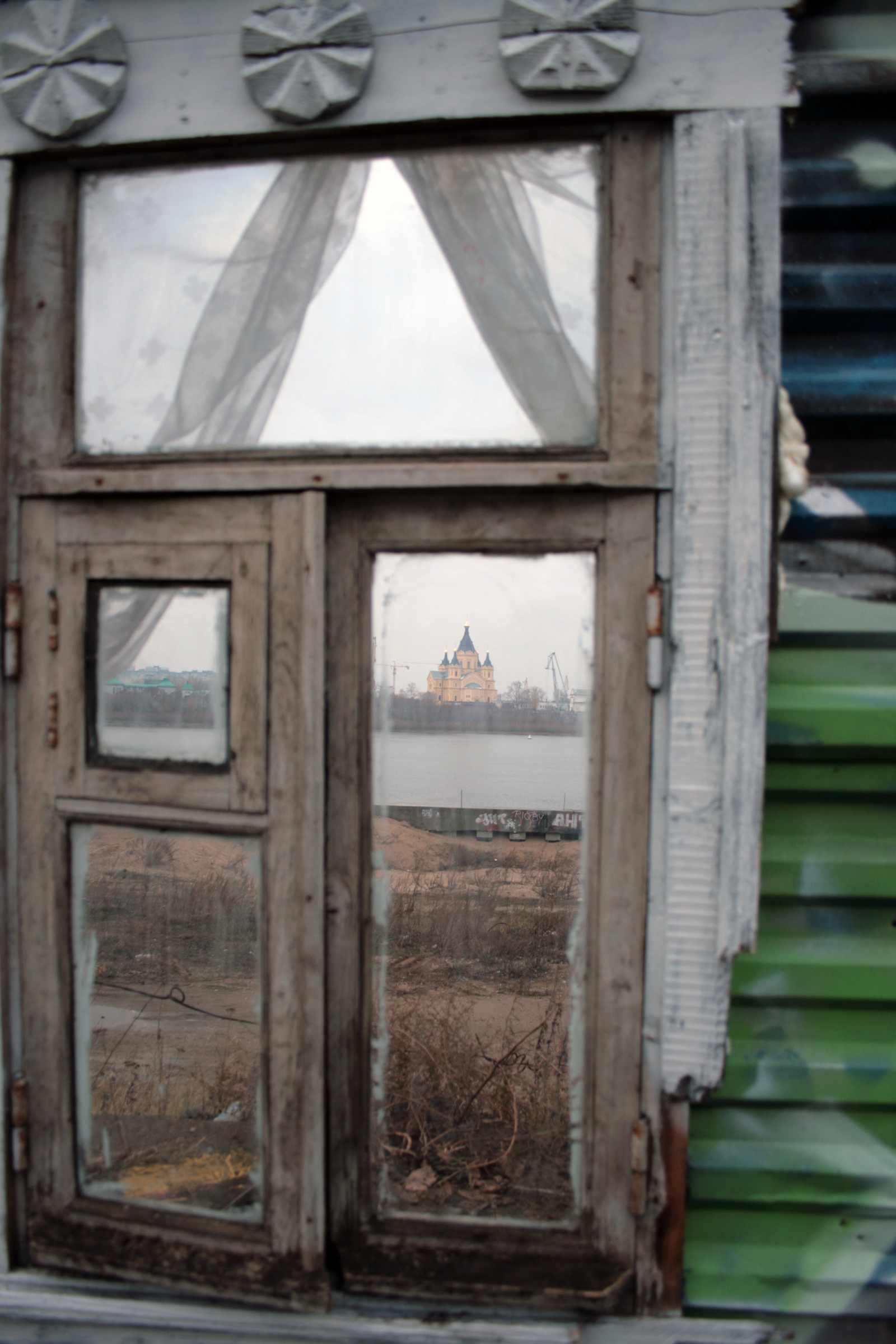 I inserted a window into the blue building fence on the Nizhny Novgorod embankment. - My, Window, , Nizhny Novgorod, Street art, Streetartnews, Russia today, Architecture, Russia, Longpost