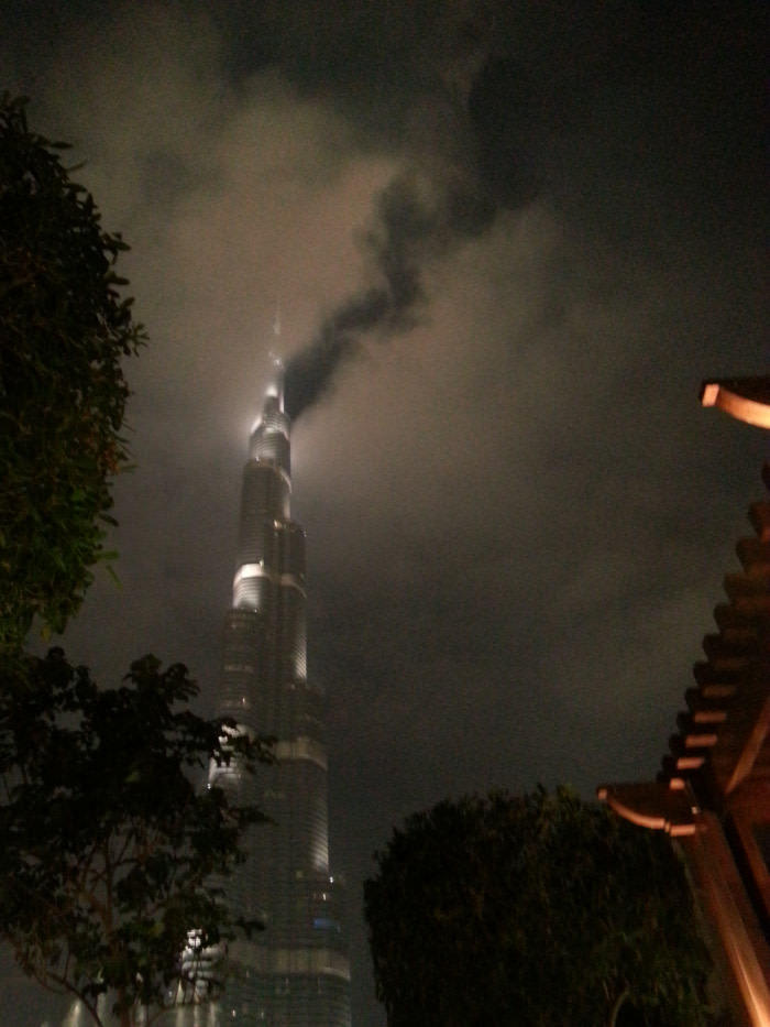 The tallest building in the world breaks the clouds... - Reddit, Dubai, Burj Khalifa