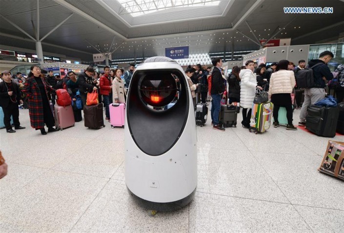 China's first robotic police officer joins China's train station - China, Robocop