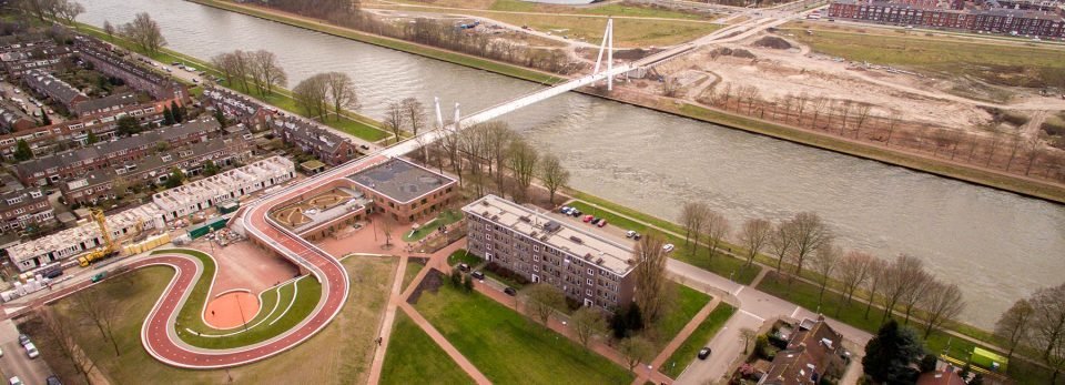 Bicycle bridge in Utrecht, passing through the roof of the building. - Architecture, A bike, Bridge, Holland, Netherlands (Holland)