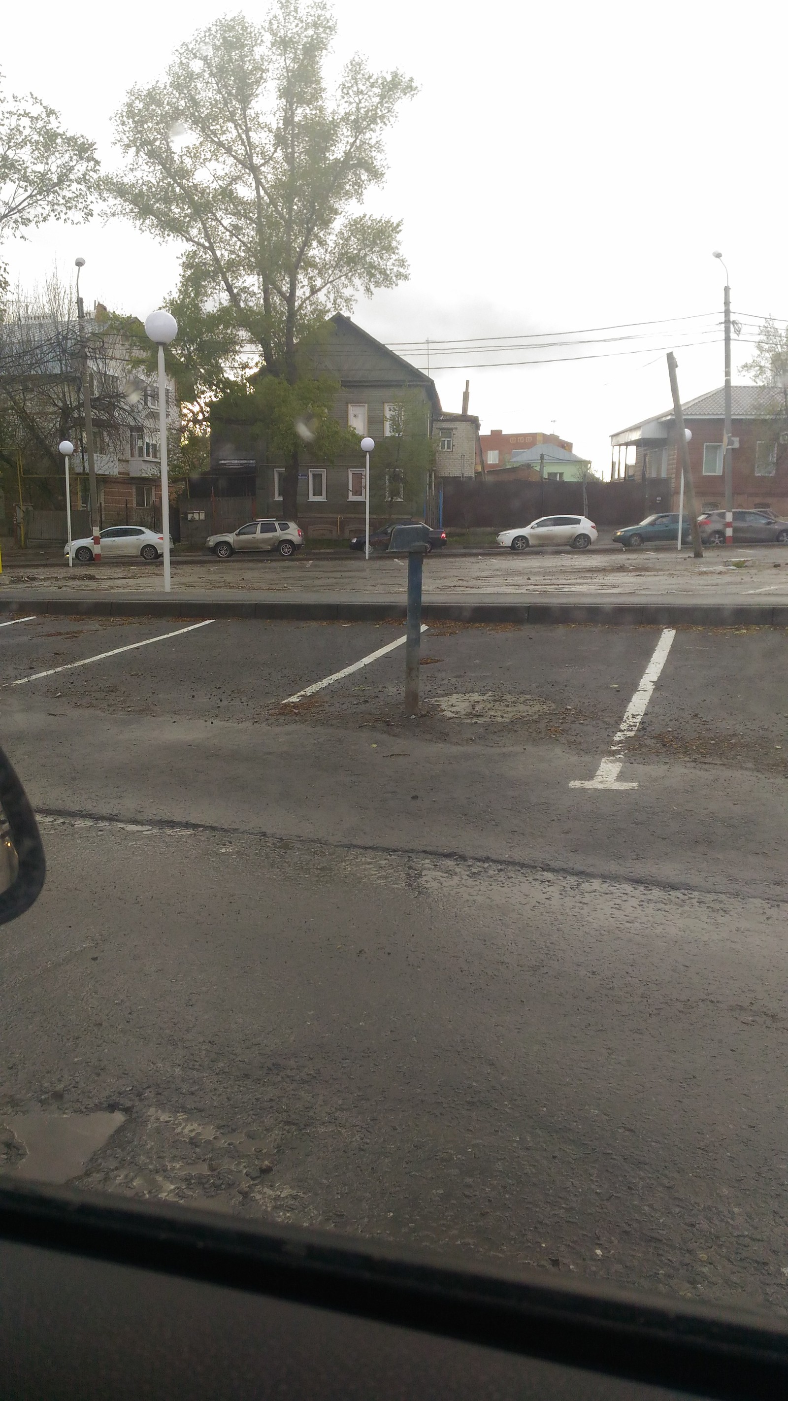 Lonely column in the parking lot - Parking, Road, Town