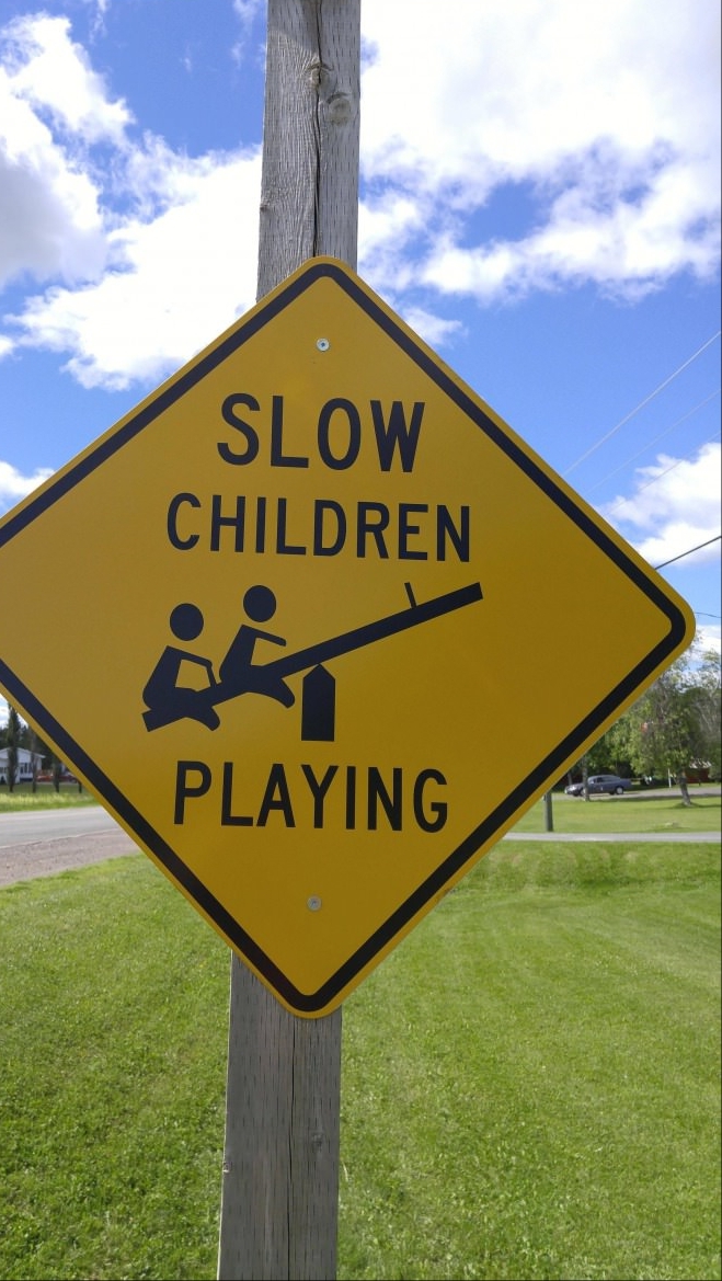 The one who came up with this sign is both a genius and burns in hell - Road sign, Playground