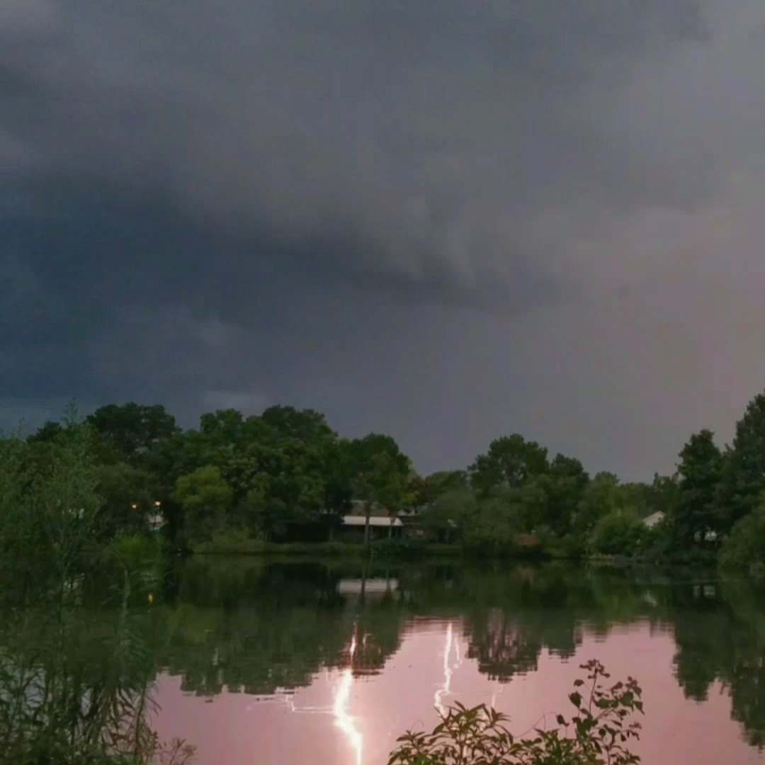 The camera on the phone is not fast enough to catch lightning, I only managed to capture the reflection in the water - Reflection, Telephone, Lightning