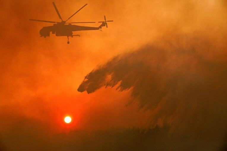 Putting out a forest fire in Greece looks like a polar bear is chasing the sun. - Greece, Fire, Helicopter, Polar bear, Extinguishing, Water