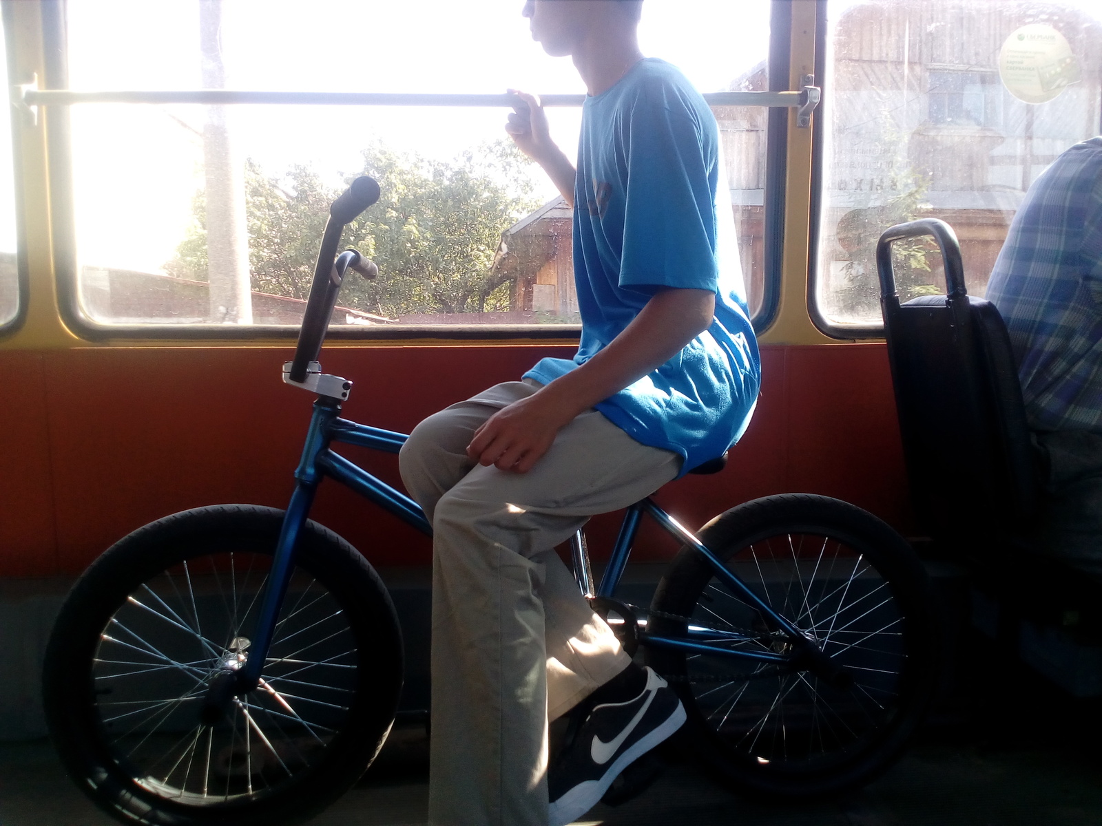 Is he comfortable? - A bike, Grace, Tram, Teenagers, Balance