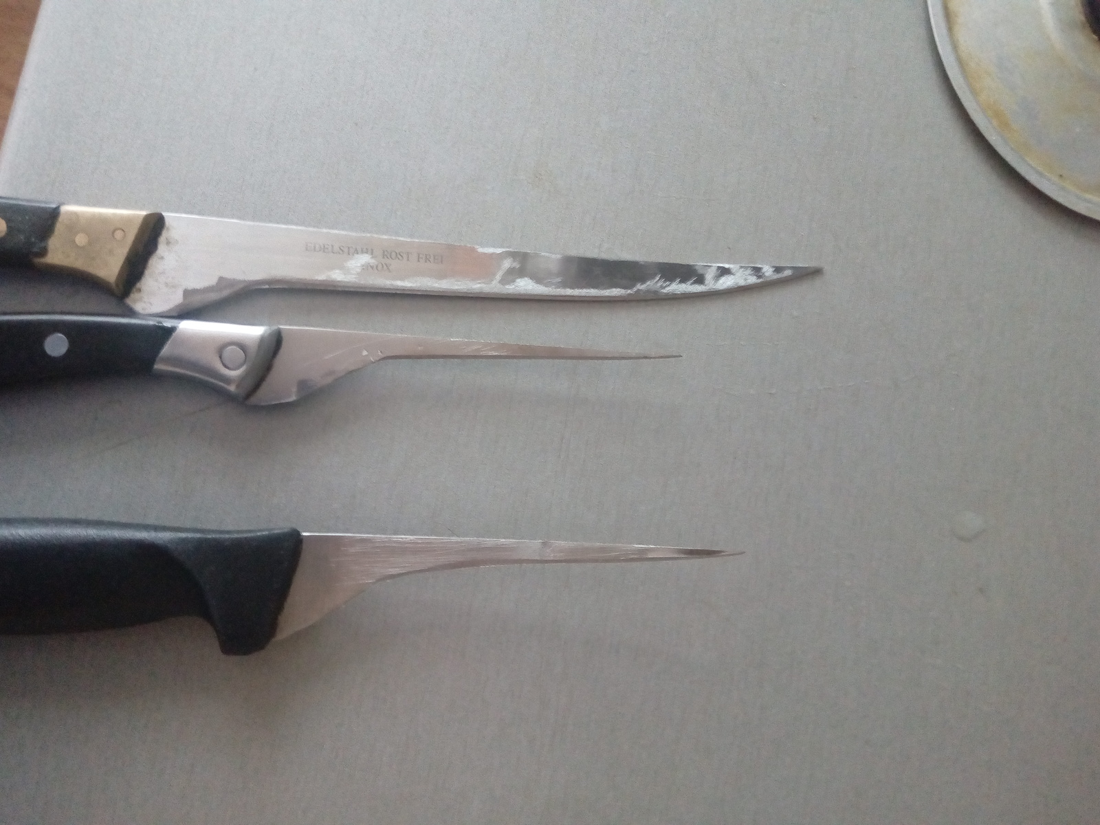 Сточенный кухонный нож