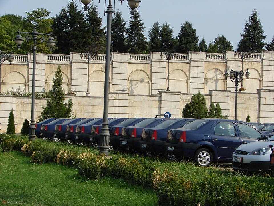 Parking lot of official vehicles of senators and deputies of Romania in front of the Palace of Parliament in Bucharest - Renault logan, Parliament