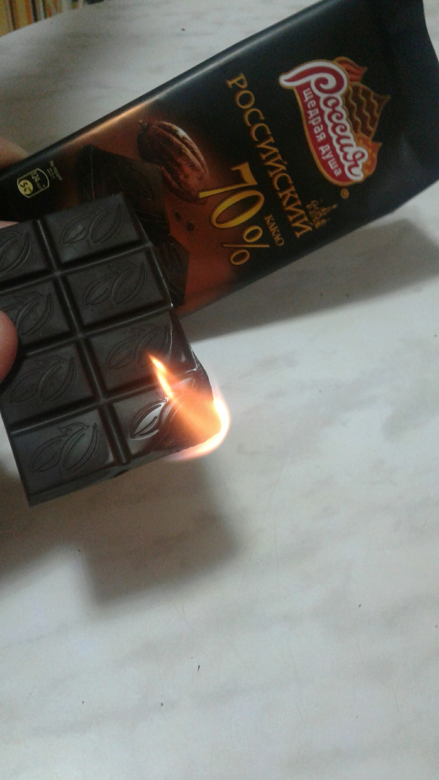 The light is out, but there are no candles? No problem! We take out the dark chocolate and set it on fire. Everything is great!)) - My, Russia, Chocolate, The photo