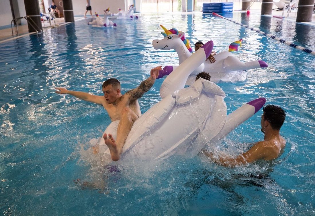 The England national football team is riding inflatable unicorns somewhere in Repino - 2018 FIFA World Cup, World championship, England, Football