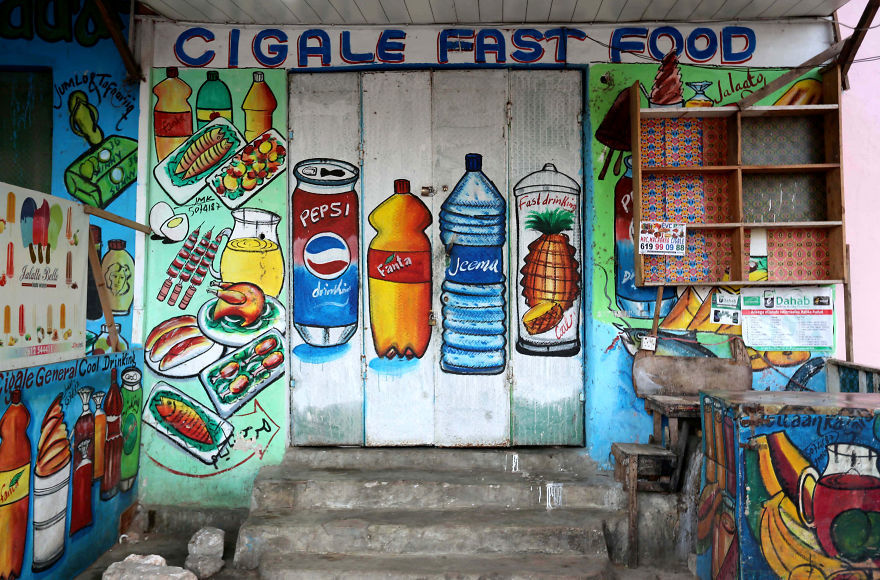 In Somalia, shop fronts are painted in such a way that illiterate residents can easily understand what they are selling there. - My, Somalia, Longpost, Street art, Artist