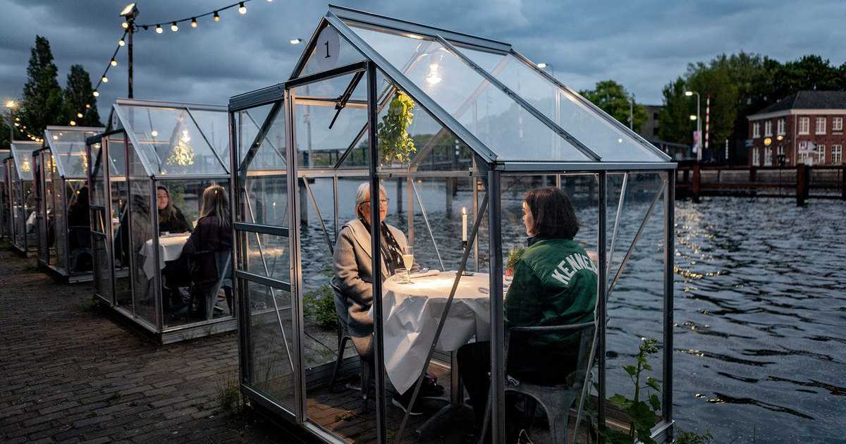 In Italy they showed what cafes and restaurants would look like after quarantine, and in Amsterdam, cafes had greenhouses on the embankment - Cafe, A restaurant, Quarantine, Coronavirus, Longpost